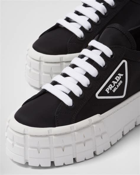 prada double wheel sneakers black|high top black Prada sneakers.